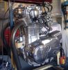 silver engine assembled in bench stand.jpg